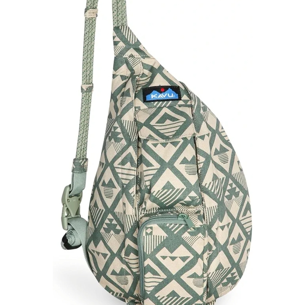 KAVU Rope Sling bag in a beige and sage green geometric pattern.
